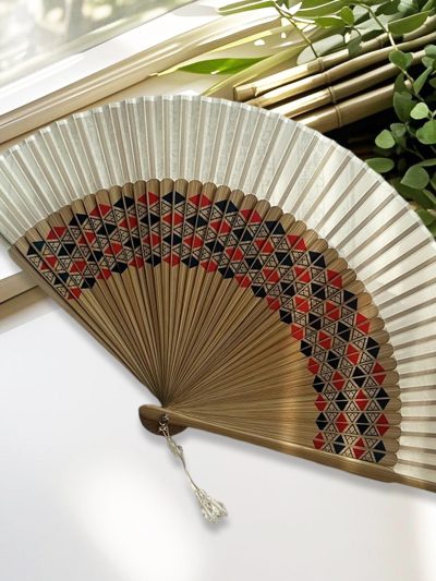 Red and black geometric triangle pattern folding fan