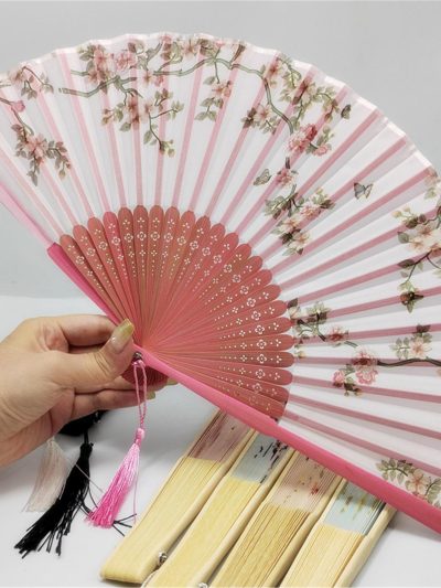 Floral patterns and perforated bamboo folding fans