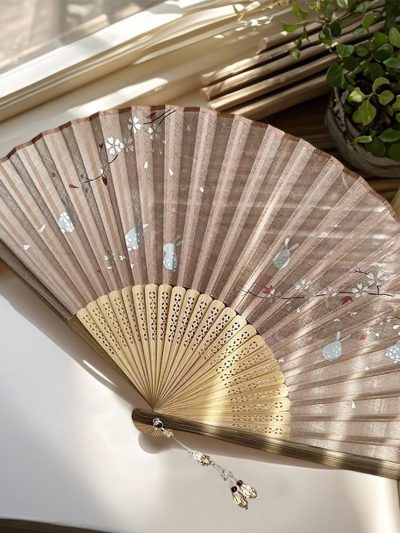 Grayish-brown gauze folding fan