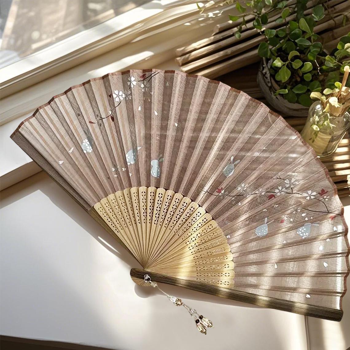 Grayish-brown gauze folding fan