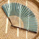 Bamboo pattern folding fan with pendant and fan cover