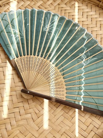 Bamboo pattern folding fan with pendant and fan cover