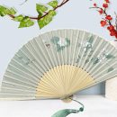 Light gray folding fan with plant and floral patterns